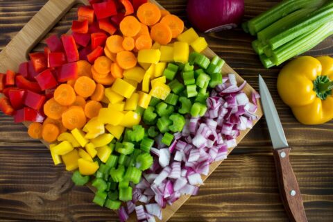 cutting-board-filled-with-a-rainbow-of-chopped-vegetables-480x320 image